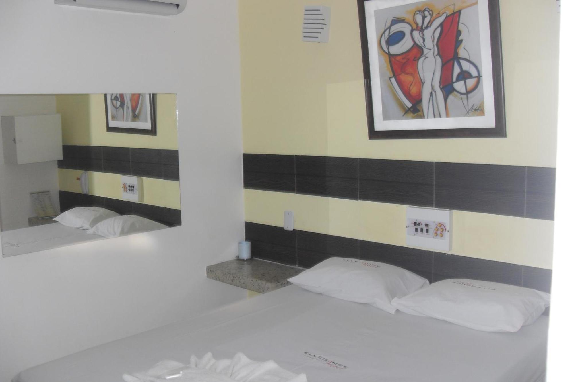 Hotel Ellegance Salvador Quarto foto