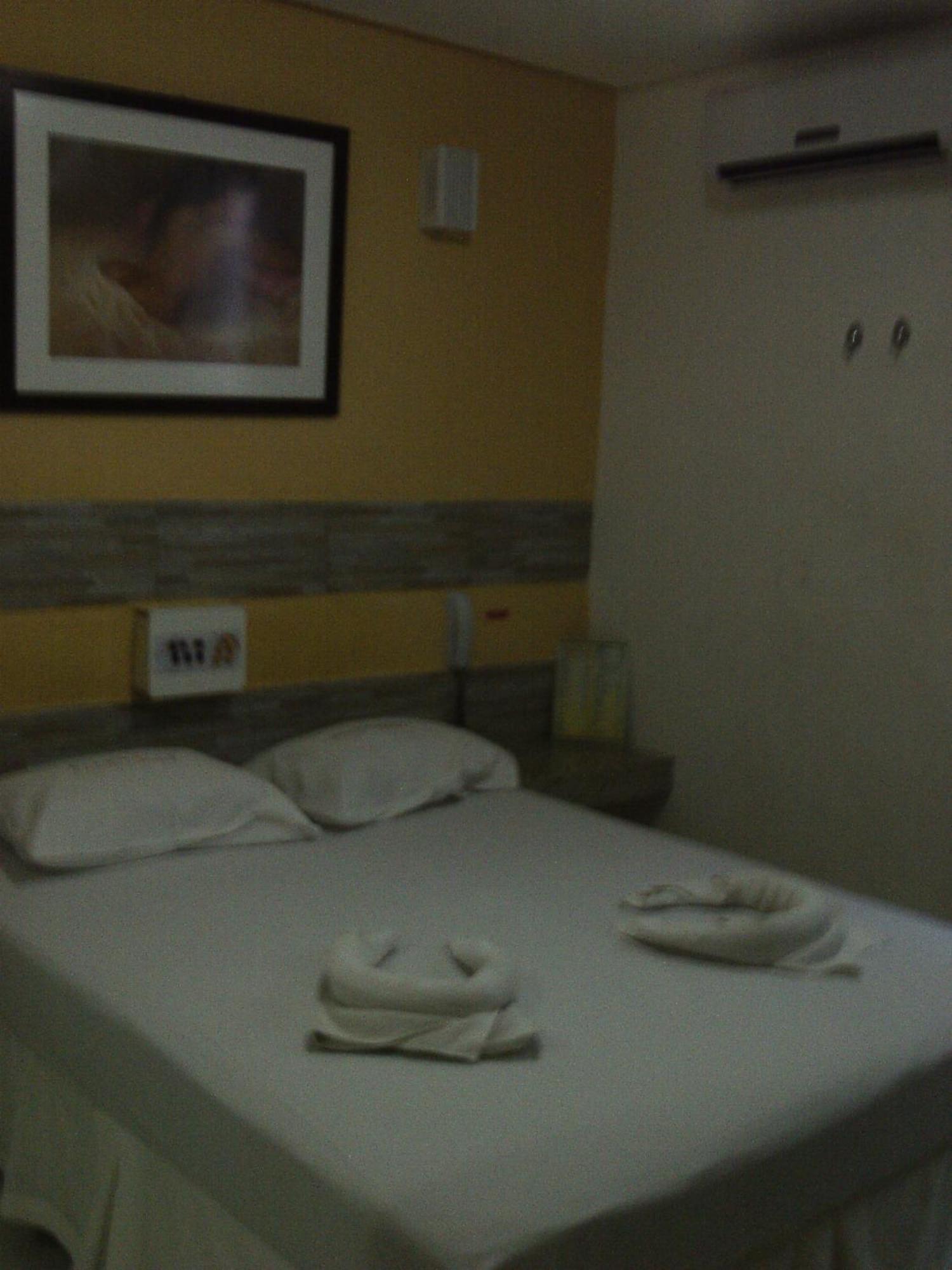 Hotel Ellegance Salvador Quarto foto